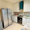 Photo 5: Large kitchen with Bosch and Miele appliances, large American fridge. 