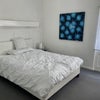 Photo 3: Large bed with overhead lighting 