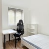 Photo 2: Bedroom Photo 2 (with desk by the window)
