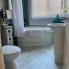 Photo 7: Bathroom with shower oppposite your room 