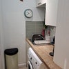 Photo 4: sink and washing machine