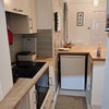 Photo 5: hob, oven and fridge