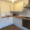 Photo 8: Fitted kitchen with fridge freezer, washing machine, dishwasher, oven & hob