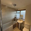 Photo 3: Shared bathroom with rainhead showed
