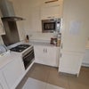 Photo 3: Kitchen / Hob / Extractor / Oven / Microwave / Washing machine & dryer / Fridge & freezer