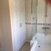 Photo 4: Family bathroom nex door 