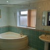 Photo 5: This is the guest bathroom