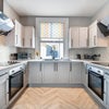 Photo 11: Communal 2 x Ovens and 4 Burner Hobs 