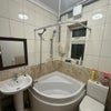 Photo 3: Bathroom, toilet 1, with electric hot shower supple