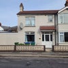Photo 5: House Front