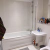 Photo 5: Smaller room bathroom