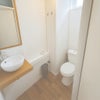 Photo 6: Downstairs toilet and sink