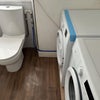 Photo 6: Toilet, washing machine & dryer