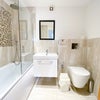 Photo 6: Communal Bathroom