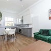 Photo 4: Kitchen/living room area