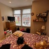 Photo 4: Rm2- front of house so loads of light