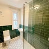 Photo 3: 1st floor bathroom with shower
