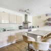 Photo 6: Spacious bright kitchen