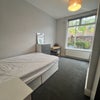Photo 2: Large double room with picture window