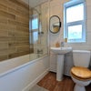 Photo 6: Stylish Bathroom Regularly Cleaned
