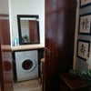 Photo 2: Storage space extra desj space and washing machine