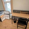 Photo 2: Large laminated room with fridge/freezer, large desk & two windows