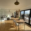 Photo 1: Living room / dining room / sea view decking