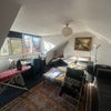 Photo 8: Living room which is sort of being used as a laundry room atm ahah