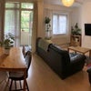 Photo 2: Living room with balcony 