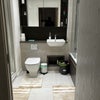 Photo 8: Toilets: the sink and sneak peek on the bathtub