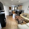 Photo 2: Fabulous open kitchen and lounge space for relaxing after work, 2 x leather sofas etc kitchen 