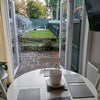 Photo 3: View of garden from dining room