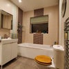 Photo 5: Bathroom, shower in corner.