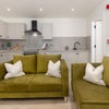 Photo 2: Kitchen & Seating Area