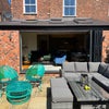 Photo 7: Sunny garden with seating area — perfect for morning coffee or a glass of wine on warm evenings