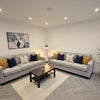 Photo 5: Bright and comfortable living area / 2 X Sofa / Table