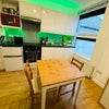 Photo 3: Kitchen/Dining Area