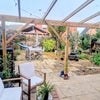 Photo 3: Garden with covered space