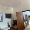 Photo 5: Lounge one corner 