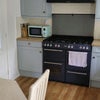 Photo 4: Kitchen/Diner : large double oven and grill range cooker with gas top rings & Microwave.