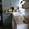 Photo 5: Kitchen units with washing machine and fridge under
