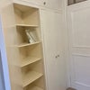 Photo 5: This is the build in storage behind your bedroom door.