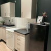 Photo 2: Fridge and dishwasher area