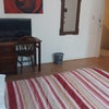 Photo 2: other side of the room desk & TV