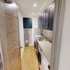 Photo 15: UTILITY ROOM WITH WASHING MACHINES AND TUMBLE DRIERS