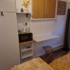 Photo 4: Desk area and cooking facility
