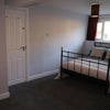 Photo 6: The Available Bedroom with double bed, chest of drawers and 1 meter wide wardrobe