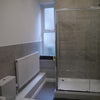 Photo 5: Bathroom 1 with large walk-in shower, sink & toilet