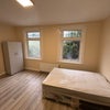 Photo 5: Spacious Master bedroom with plenty of natural light and built-in storage