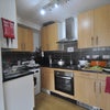 Photo 3: The shared kitchen